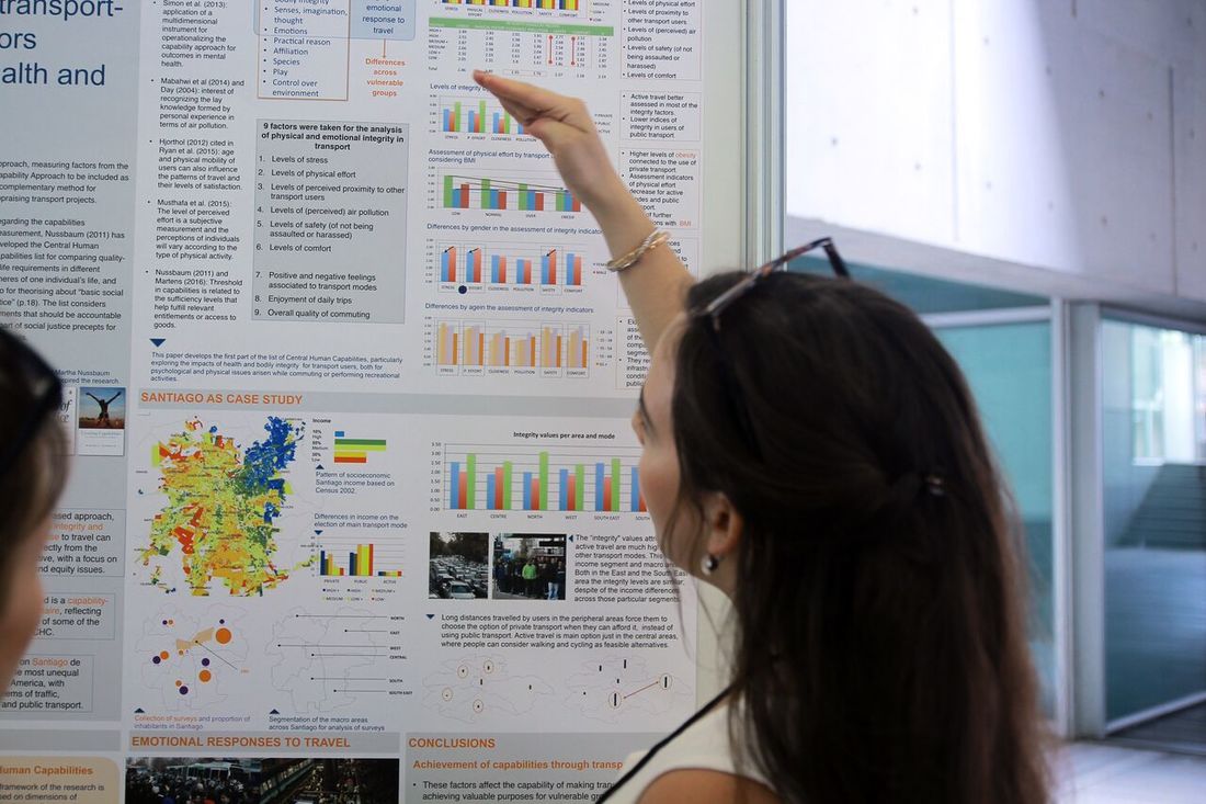 A lady at the ICTH conference presents a poster about transport and health